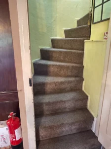 Stairs to upstairs rooms